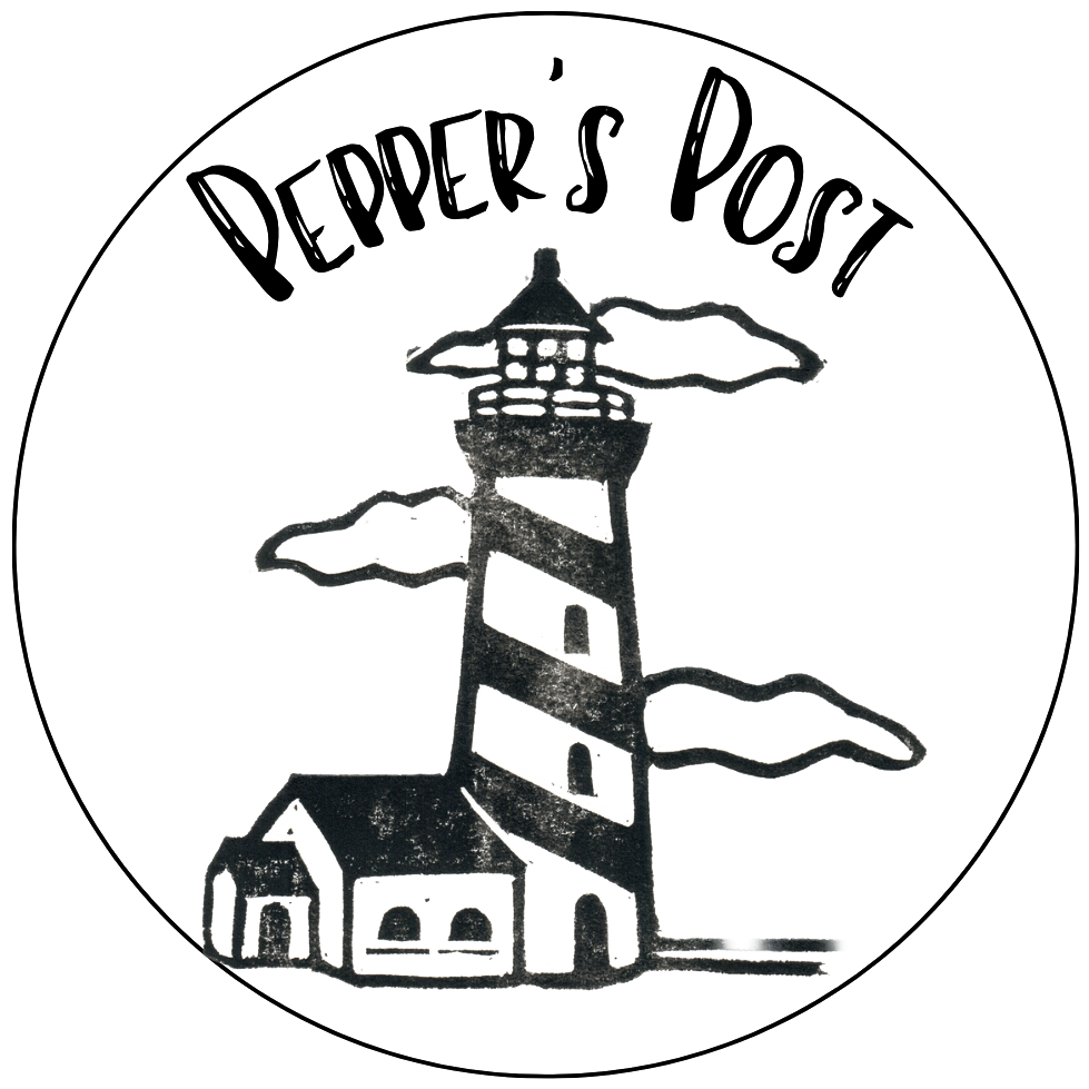 Site logo, a block-printed lighthouse